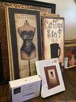 Two wooden framed vintage style signs spelling 'Paris Lingeries' and 'Coffee Stop' with two 4x6 photo frames in original boxes in front