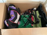Photo showing box with Trailmaker duffle bag, Cubs foldable backpack, Ordning & Reda foldable totes and black quilted tote