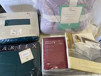 Photo showing all bedding and plush throw items in original packaging.