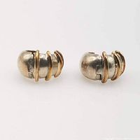 Pair of sterling silver earrings with three gold bands on each, shown front facing.