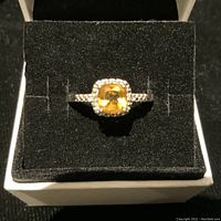 Front view of ring centered in black velvet insert