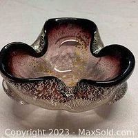 Purple Murano art glass dish with gold flecks in clear photo showing shape and coloration.