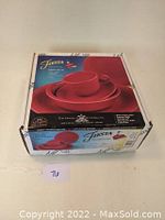 Closed original box showing the brand 'Fiesta' and red dinnerware set items photo on the front.