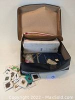 Shoebox with loose wheat pennies and plastic bag containing coins in 2×2 cardboard holders