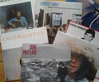 Photo showing 10 LPs by 1970s male singer-songwriters including 4 Gordon Lightfoot albums and others by Paul Simon, Cat Stevens, Don McLean, Andrew Gold, Steve Forbert and Arlo Guthrie.