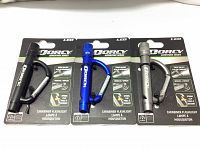 Three new Dorcy carabiner flashlights in black, blue, and silver on original packaging displaying LED, whistle, and spring clip features.