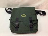 Front view of the dark green khaki EDC by Esprit shoulder bag with flap and buckle closures