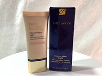 Photo showing the foundation tube and its original dark blue box with gold and white text: Estee Lauder Double Wear Light Soft Matte Hydra Makeup 1 fl.oz/30ml.