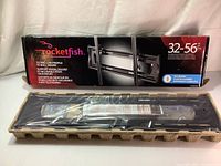 Box and contents of new Rocket Fish tilting low-profile TV wall mount for TVs 32-56 inches.