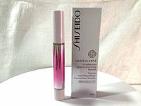 Front view of the Shiseido White Lucent OnMakeup Spot Correcting Serum tube and its white box packaging set against a light background.