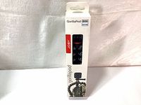 Front view of the product packaging showing the Joby GorillaPod 500 Action tripod inside, with branding and product image of tripod holding a camera.