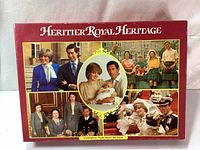 Top view of the vintage puzzle box showing royal family images and branding.