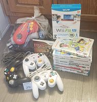 Showing all controllers, games, and the Wii Fit U Fit Meter box