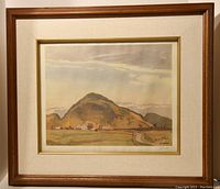 Framed A.J. Casson limited edition print showing full landscape artwork in frame
