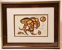 Front view of framed abstract Indigenous art print with earth tone colors.