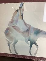 Full view of watercolor style artwork depicting a woman on a horse with cream background and printed text 'Carol Grigg / Editions Gallery'.