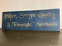 Full view of vintage wooden sign showing gold hand painted text on blue background