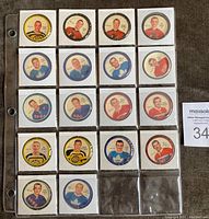 Front side of 18 1961/62 Shirriff hockey coins showcasing player images in colored border mounts organized in a sheet protector.