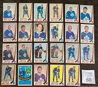 Front side of 23 hockey cards showing players primarily of Toronto Maple Leafs from 1969-70. Cards in varied condition with original gloss, featuring team uniforms and player names.
