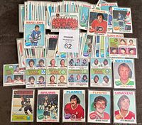 Full spread of all the 91 hockey cards laid out showing front faces with player images and team names. Includes stars and rookies from multiple teams.