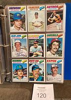 Nine cards in three-up plastic binder page: Sal Bando #310, Dock Ellis #125, Jose Cruz #275, Alan Ashby #205, Gaylord Perry #246, Keith Hernandez #437, Dave Pagan #390, Richie Zisk #183, Steve Rogers #464.