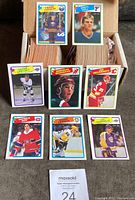 Stack of 1988-89 OPC cards in box showing card edges