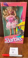 Front view of the Style Magic Barbie doll in original 1988 box with pink dress and clear window showing doll inside.