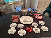 Full lot on table with visible plates, pitchers, and textiles