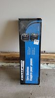 Box side view of Certified tire shelves showing product name and photos of the shelves holding tires.