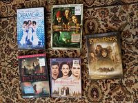 Photo of five DVDs: Dreamgirls, Pirates of the Caribbean: Dead Man's Chest (3-disc special edition), The Lord of the Rings: Two Towers, The Lost Boys: The Tribe, Twilight Saga: Breaking Dawn (Blu-ray)