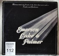 Outer cover of the set showing the black background with white text 'Emerson Lake & Palmer' and spotlight graphic.
