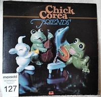 Front cover of Chick Corea Friends LP showing cartoon animal characters playing instruments.