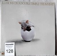 Front cover of the Triumvirat Illusions on a Double Dimple vinyl record album showing a white mouse emerging from an egg on a plain light background.