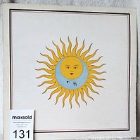 Front cover of King Crimson 'Larks' Tongues in Aspic' vinyl LP showing sun illustration.