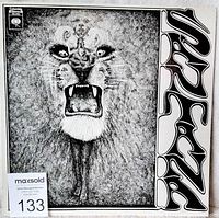 Front cover of Santana debut LP showing roaring tiger and 'Santana' logo with auction lot tag.