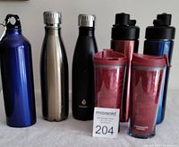Photo showing all 7 insulated bottles and tumblers, highlighting their colors and caps.