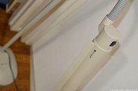 Close-up of the Ott-Lite branded light head with on/off switch visible.