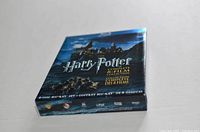 Front of the Harry Potter 8-film Blu-Ray compilation box showing artwork of Hogwarts and title