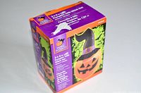 Box showing brand, title, and the image of the inflatable pumpkin with witch hat.