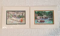 Two matted prints by Linda Levine laid side by side on a white surface, showing overall look and matting style.