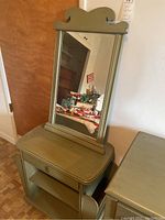 Front view of the night stand with attached mirror