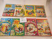 Eight vintage Archie and Jughead comic digest books showing colorful covers with characters and titles from the 1970s.