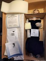 Packaged Ashton-Drake Galleries Diana Princess of Wales doll in original box with Certificate of Authenticity and additional papers.