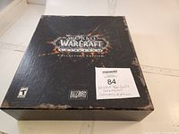 Original black World of Warcraft Cataclysm Collector's Edition box with worn corners and prominent logo on top.
