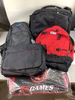 Full view of the five assorted bags showing various brands Nike, Altitude, and SR Games.