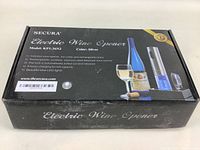 Box for Secura Electric Wine Opener model KPI-36N2 in silver. Shows front of box with product features and images.