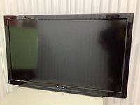 Front view of Panasonic 42-inch LCD TV showing screen and frame on a white surface.
