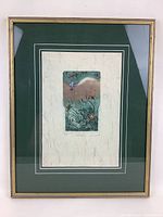 Full view of the framed etching showing the artwork centered in green and cream double mats inside a metallic frame.