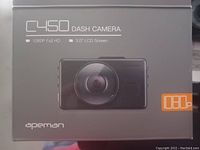 Apeman C450 dash camera box showing front with branding, model, and key features (1080p Full HD, 3.0 inch LCD screen).
