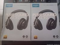 Front box view of two Soundcore wireless headphones showing model Life Q30, Pure Sound Noise branding, Hi-Res Audio sticker.